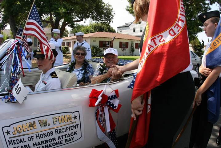 John Finn greeting fans and friends as the Coronado Fourth of July Parade stages
