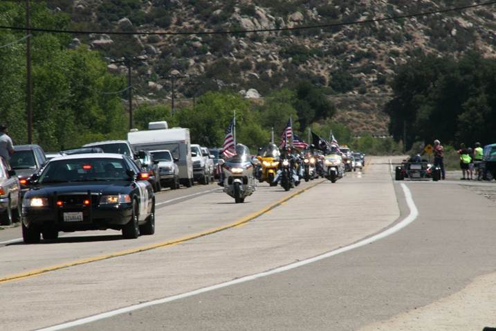 California Highway Patrol and dozens of motorcycles escorting John Finn to his birthday party