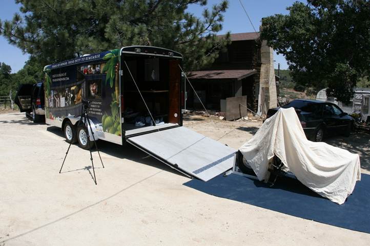 Metal of Honor covered for a grand unveiling at John Finn’s home