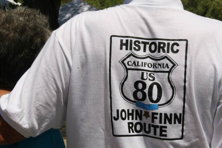 Guests wearing shirts marking the newly designated Historic John Finn Route on Old California Highway 80