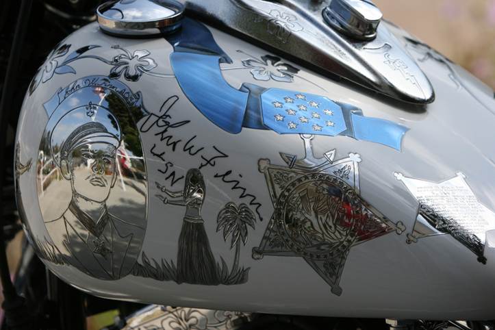 Close view of John W. Finn’s autograph on the Metal of Honor gas tank