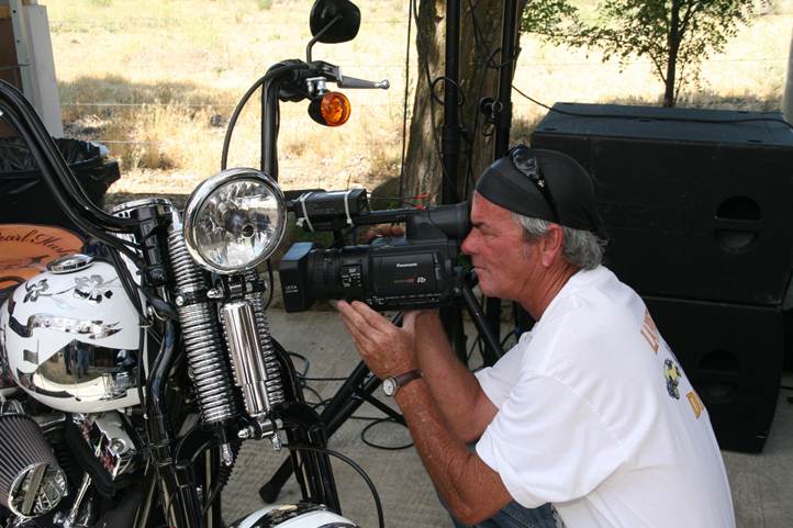 A press photographer shooting close-up images of Metal of Honor