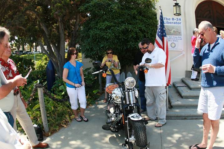 A crowd gathering around Metal of Honor at the Veterans Museum